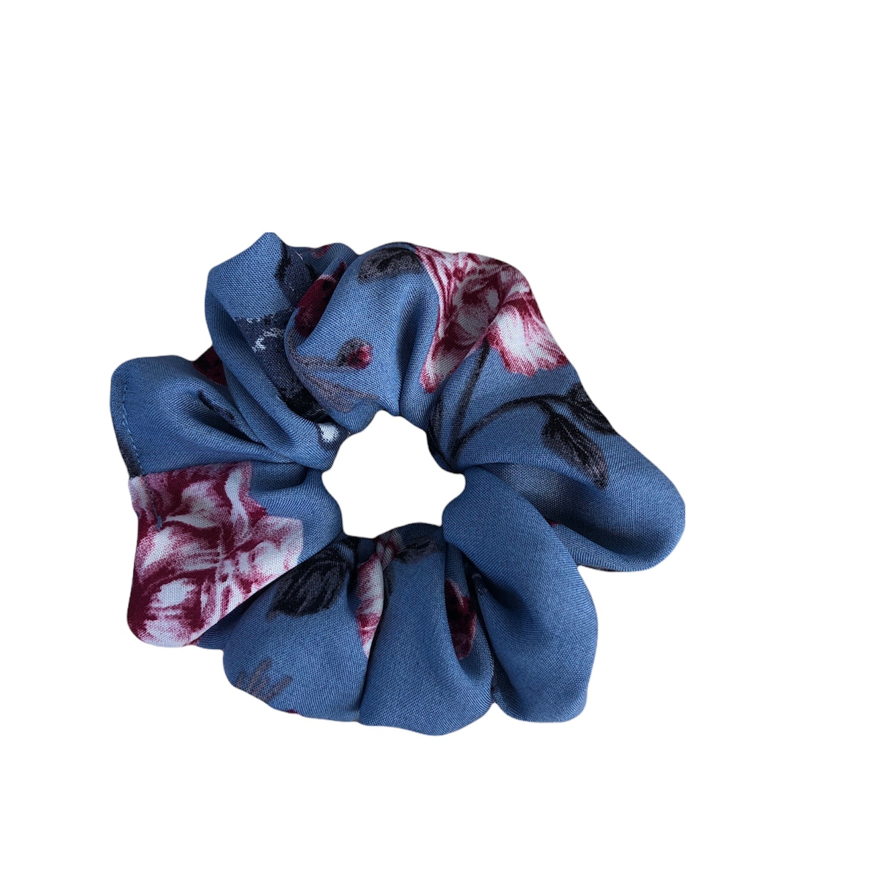 Regular Florence Scrunchie. An average sized periwinkle blue rayon scrunchie with floral accents. 